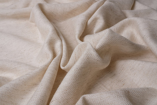 Close-up view of undyed cotton linen peshtemal fabric texture, natural and unprocessed