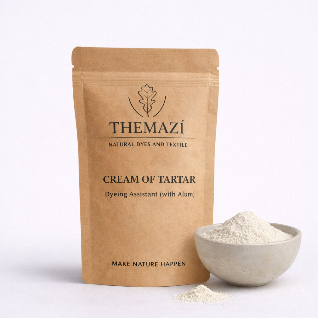 Dye assists: themazi cream of tartar in a kraft pouch with a bowl of powder