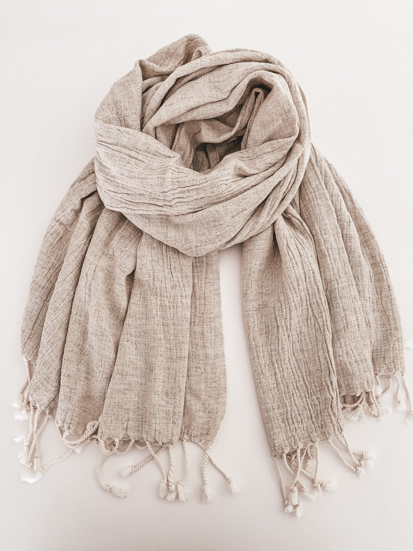 Handwoven linen cotton peshtemal with a naturally crinkled texture, lightweight and breathable, made in Turkey