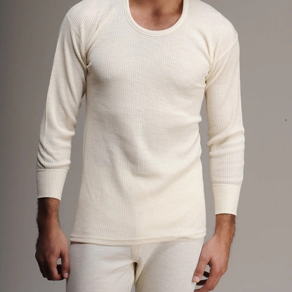 Side view of the model wearing the 100% Merino Wool Long Sleeve T-Shirt, showcasing its fit and Woolmark certification logo