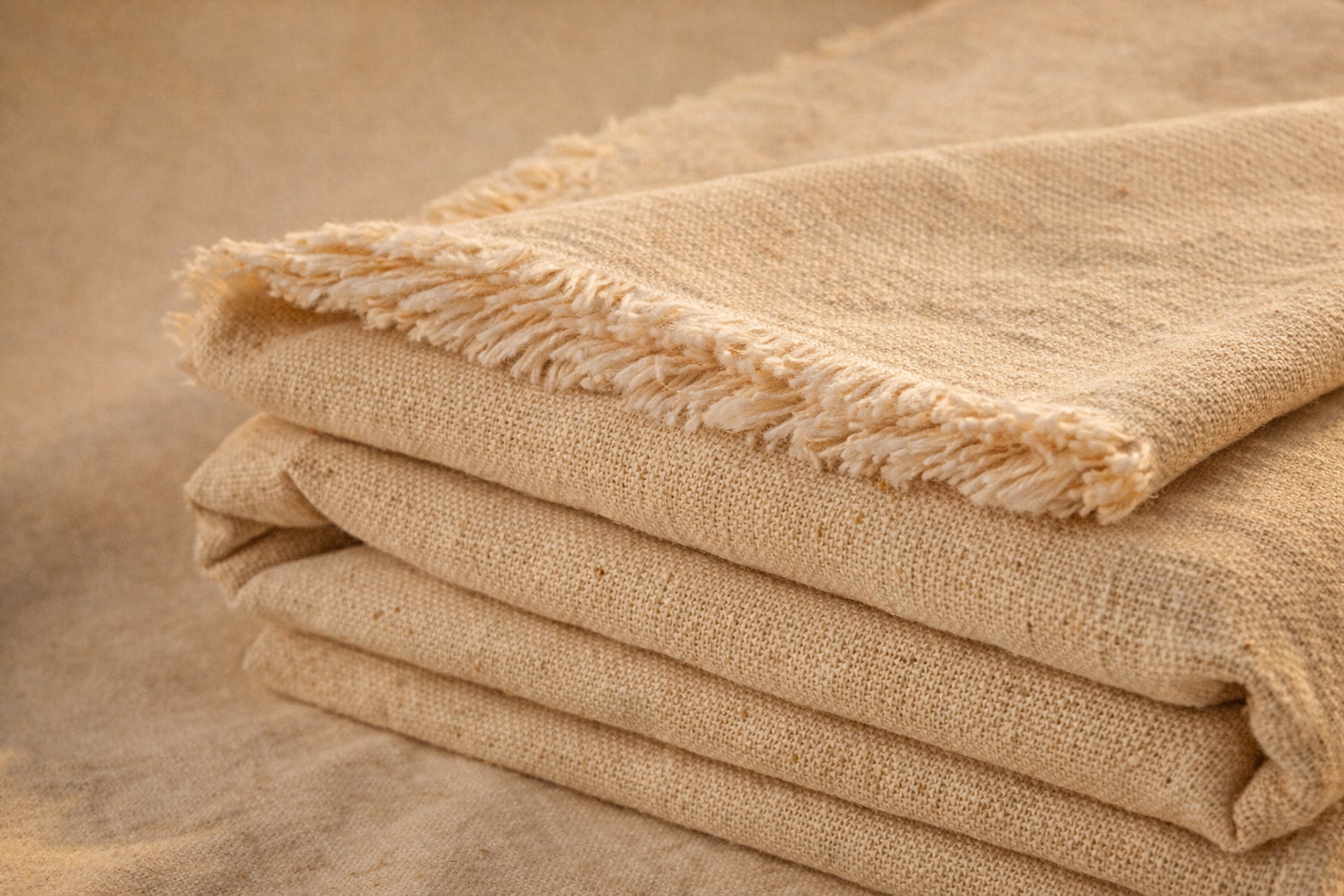 Folded undyed cotton-linen fabric with natural texture, 220 cm wide—dye-ready for natural dyeing and sewing