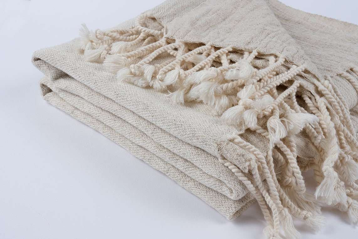 Handwoven peshtemal fringe detail with twisted cotton threads, artisanal finish made in Turkey
