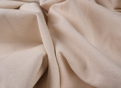 Natural undyed cotton canvas fabric with soft drape, suitable for natural dyeing, sewing, and textile experiments