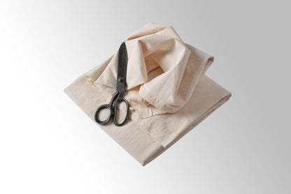 Detailed weave of untreated undyed cotton fabric prepared for natural dyeing
