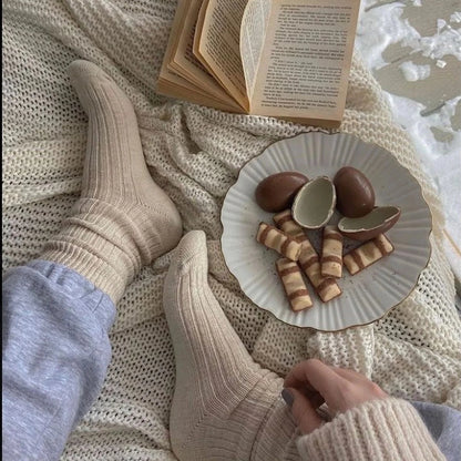 Undyed cotton socks worn after natural dye application testing