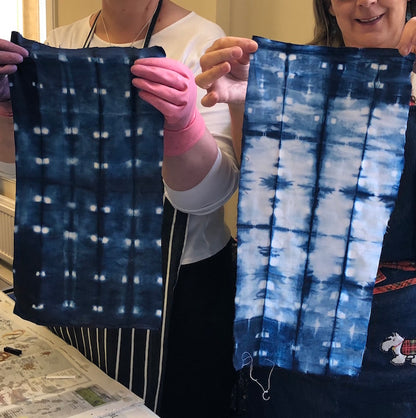 Shibori-dyed cotton fabric in indigo vat using Natural Indigo Extract (Indigofera tinctoria)